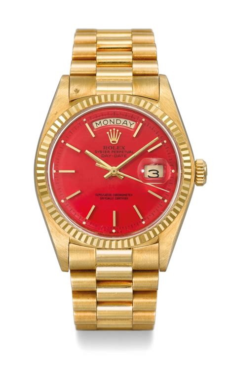 gold rolex red dial